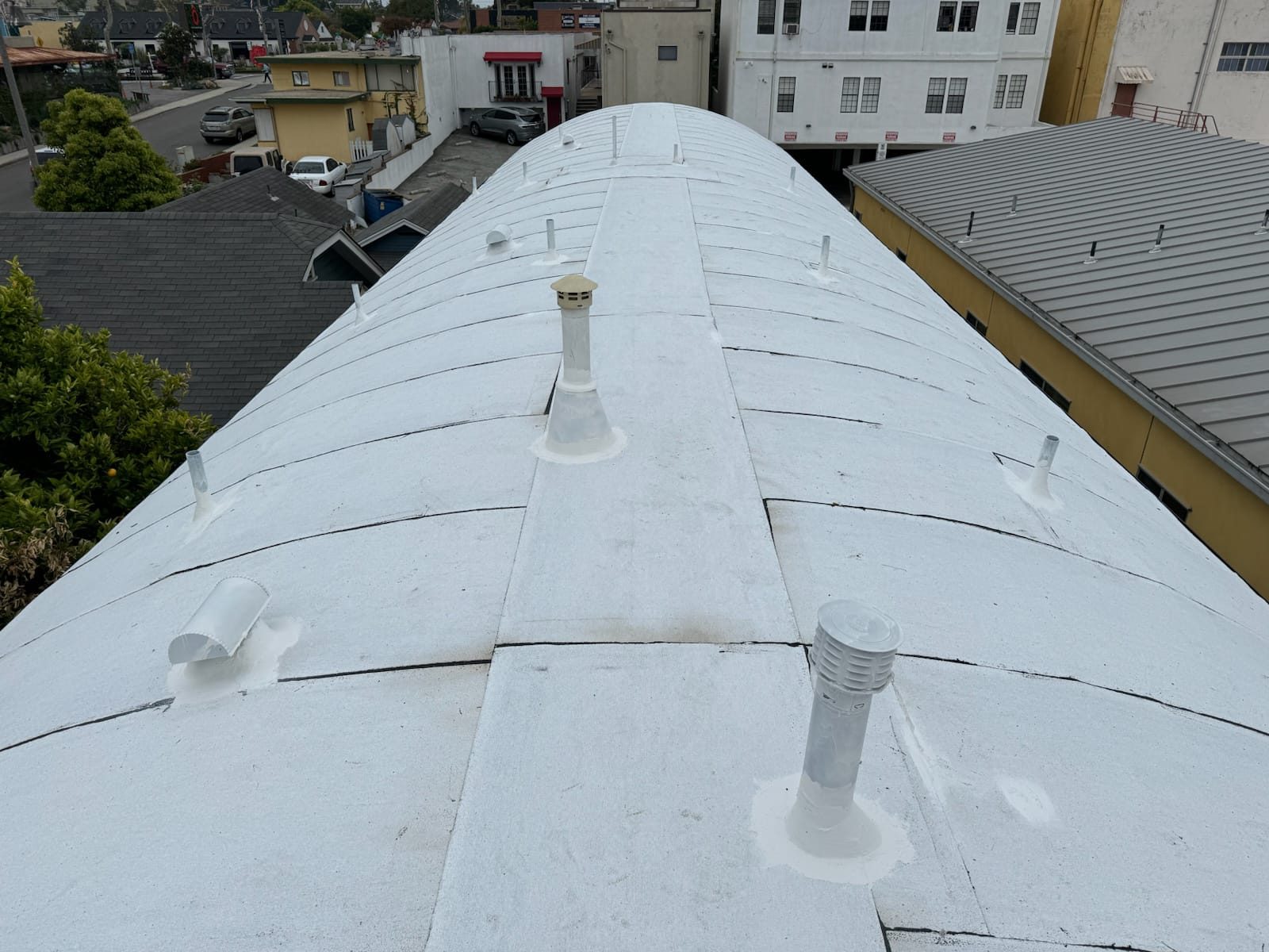 flat roof with white reflective coating on a home in El Segundo, California — a Samuel Roofing Inc. job photo