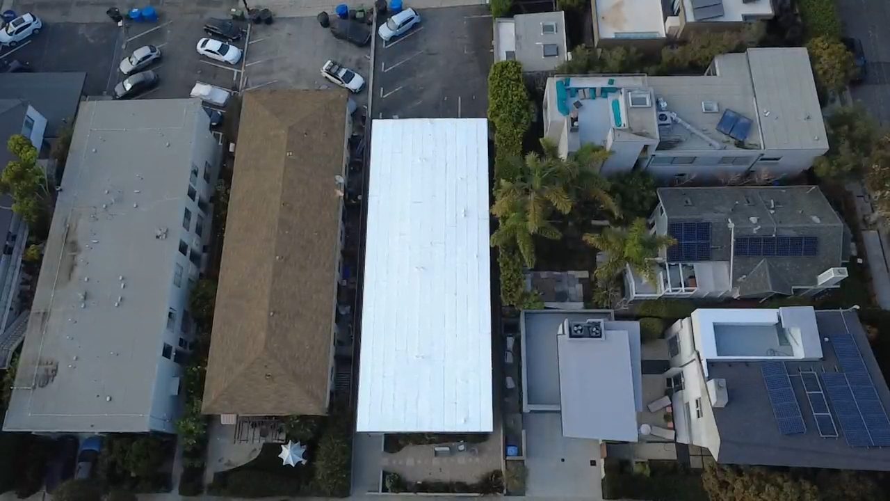 flat roof with white reflective coating on a home in Santa Monica, California — a Samuel Roofing Inc. job photo