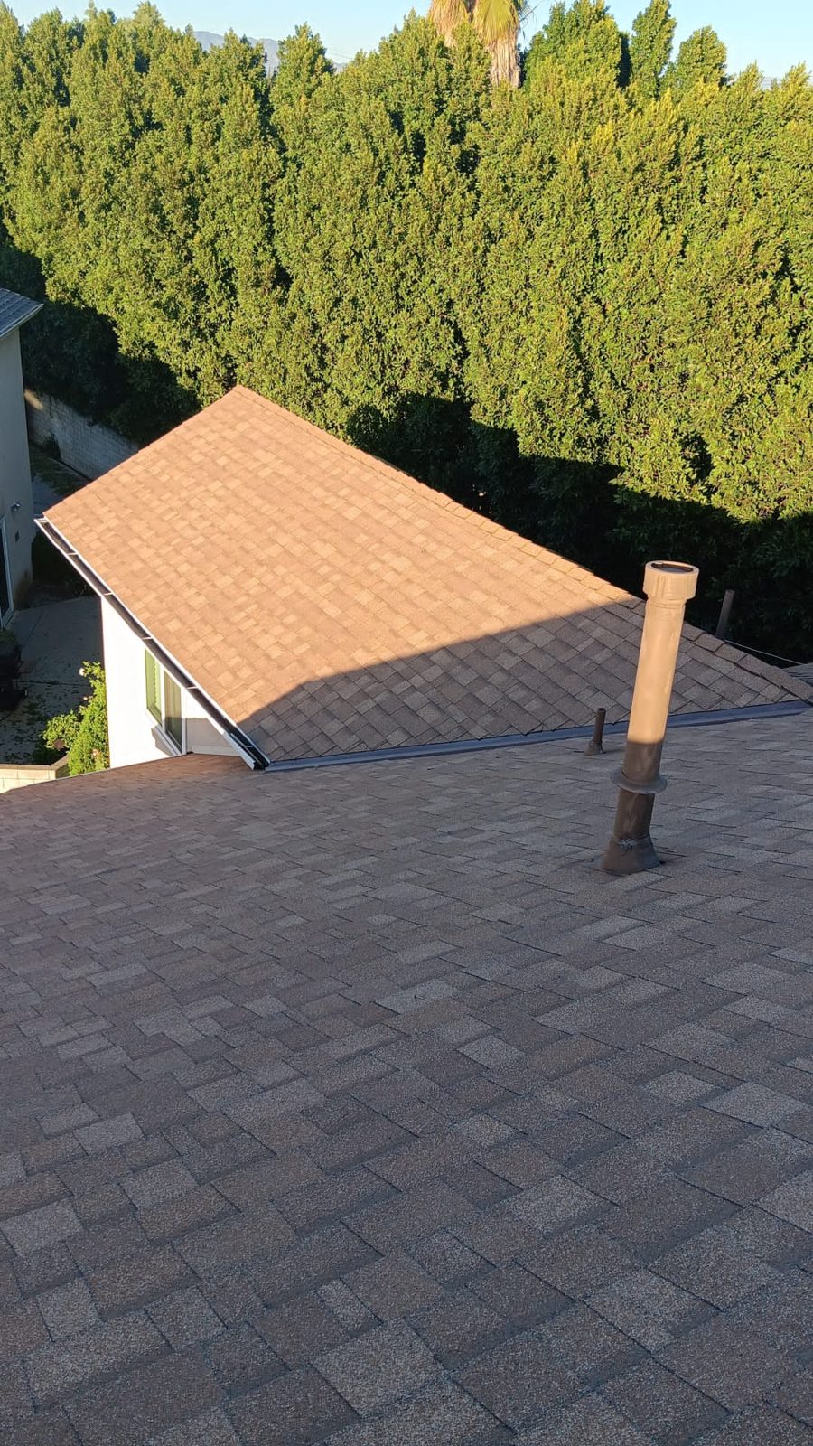 flat roof with white reflective coating on a home in Tarzana, California — a Samuel Roofing Inc. job photo